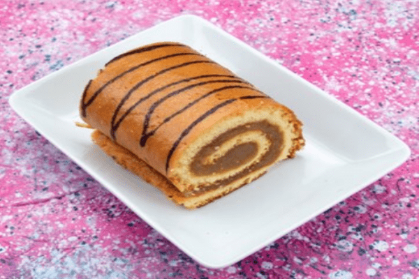 Rocambole de doce de leite - Imagem via KamranAydinov no Freepik